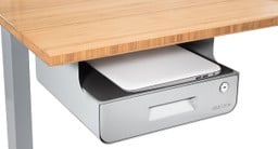 The built-in padded shelf houses laptops and devices up to 13" by 13"